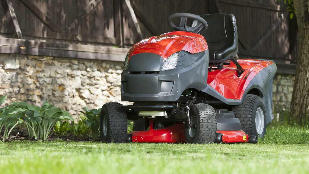 ride on mower in garden