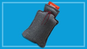 stoov homey hot water bottle on a blue background