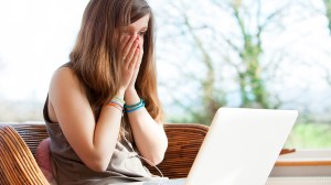 teenager_shocked_at_what_they_see_on_their_laptop_screen