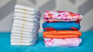 pile of disposable and reusable nappies