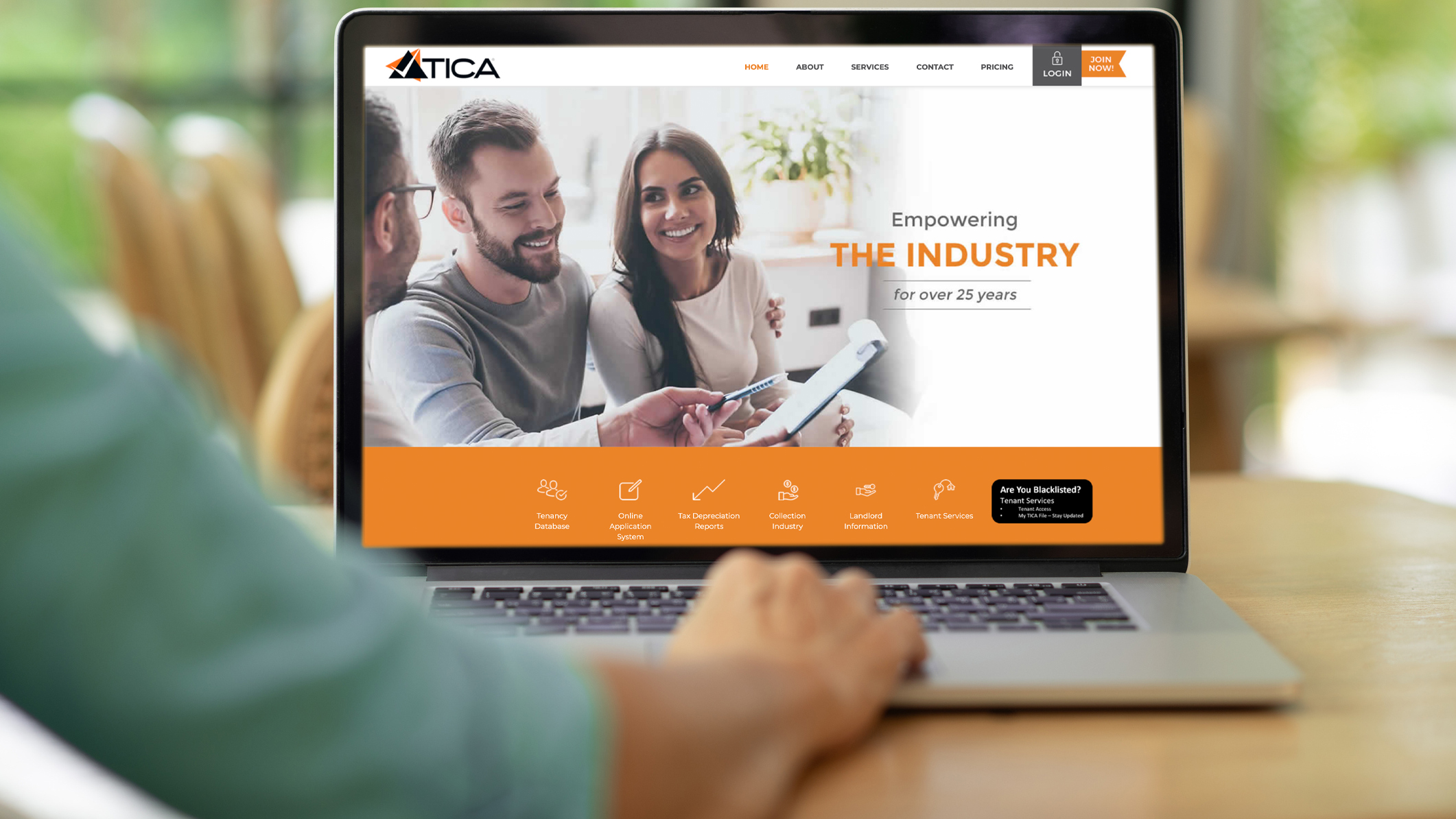 tica website on laptop