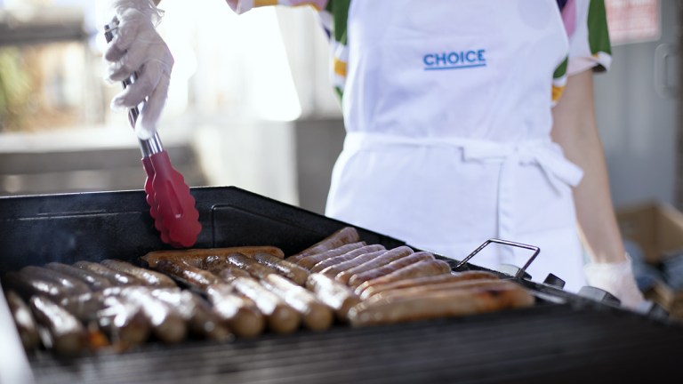 alice cooking the sausages