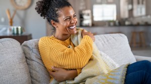 woman warm in winter blanket lead