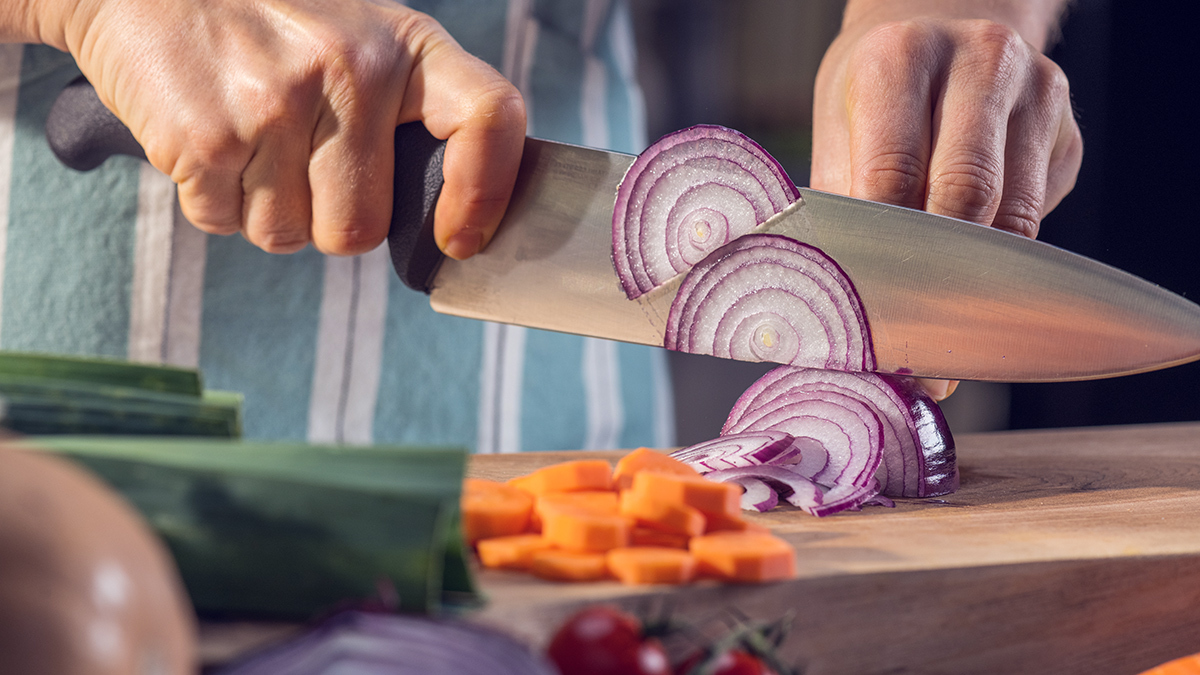 mature_person_chopping_vegetables