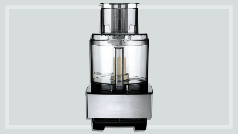 silver food processor on a grey background