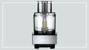 silver food processor on a grey background