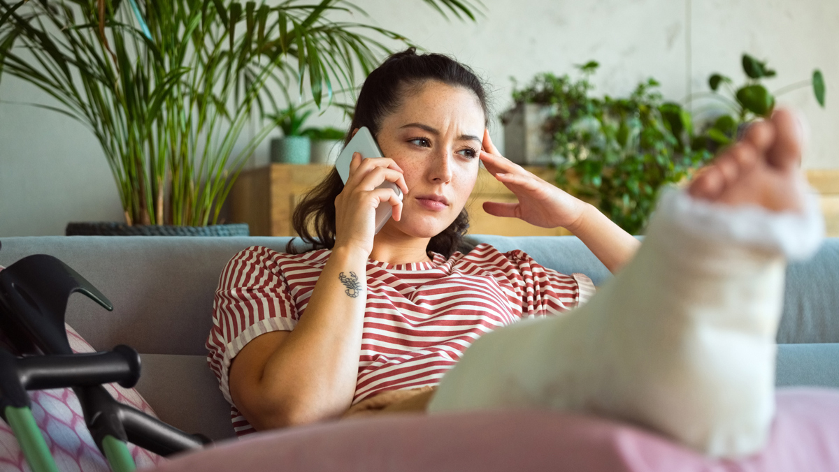 young woman with broken foot health insurance