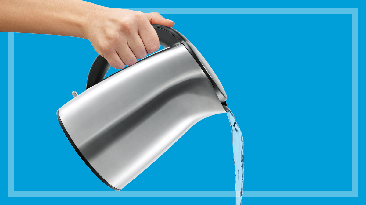 person pouring from a silver kettle