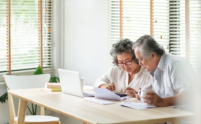 retirees_looking_over_paperwork