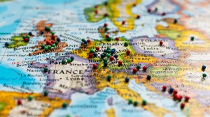 several push pins placed in destinations on a map