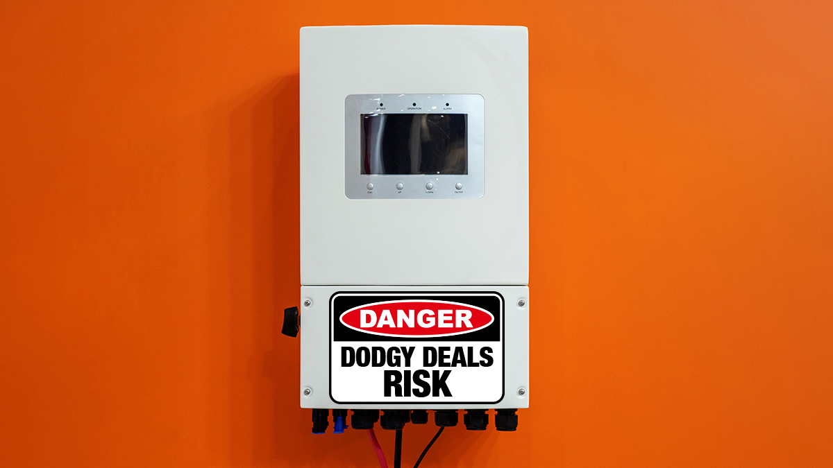 Solar inverter with danger dodgy deal warning sign