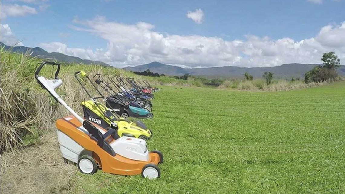 Lawnmowers about to be tested in a field with specially prepared grass