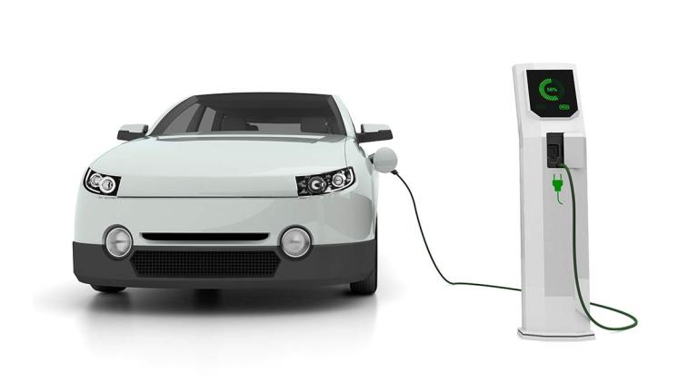 electric vehicle plugged into charging station