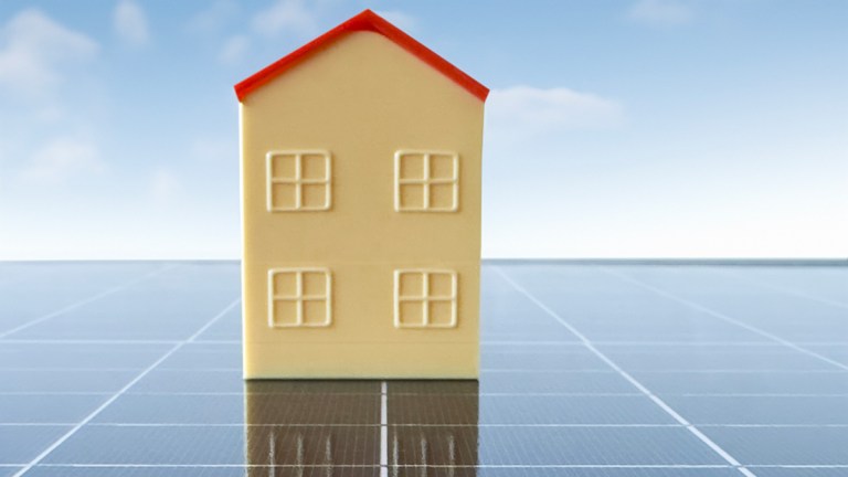 Model house on solar panel