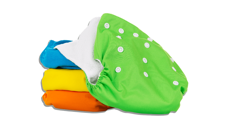 colourful reusable cloth nappies in a stack on a white background