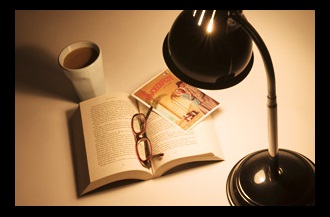 lamp and book with warm lighting